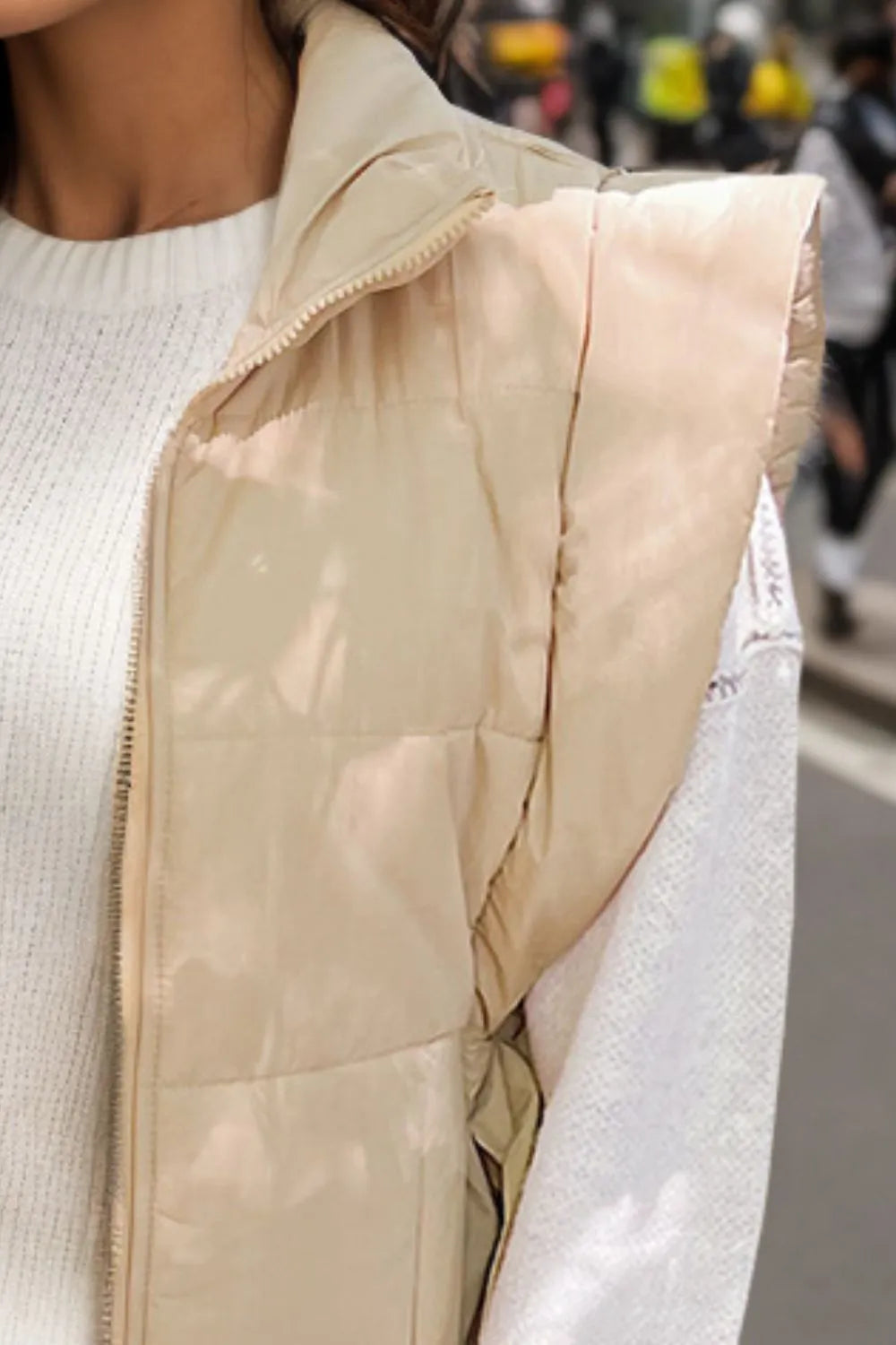 Pear Daisy pocketed zip-up vest coat, a cozy home and garden apparel piece featuring front pockets and a full zipper.