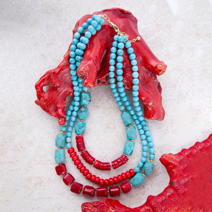 Start2Finish Guadalupe blue turquoise and red coral statement necklace with gold accents, featuring bold jewelry design.