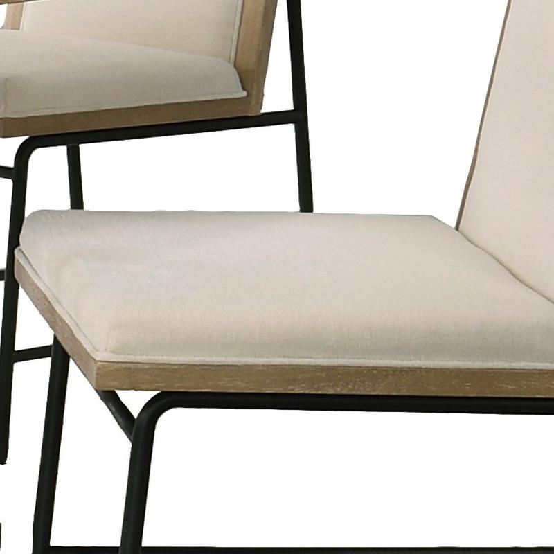 Set of two Start2Finish Torrance oak finish dining chairs with wooden frames and cushioned seats.