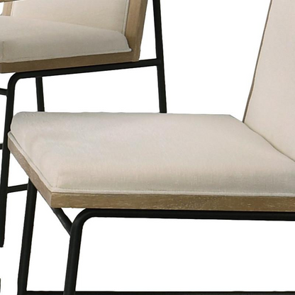 Set of two Start2Finish Torrance oak finish dining chairs with wooden frames and cushioned seats.