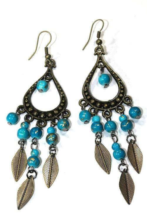 Silver Hestia Free Spirit Leaf Dangler Earrings featuring delicate leaf-shaped silver charms on ear hooks.