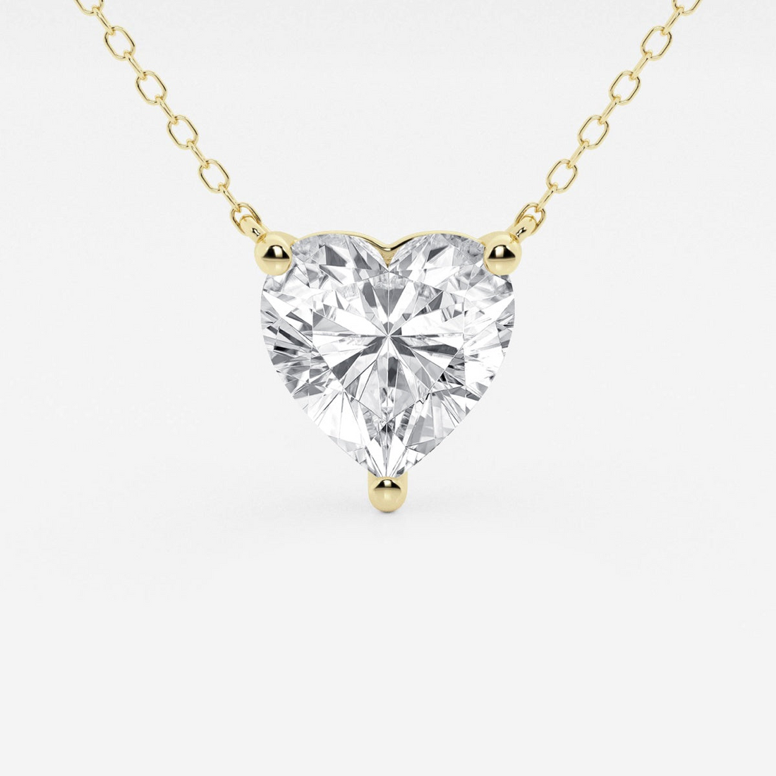 Floating heart-shaped lab-grown diamond pendant necklace in 14K white or yellow gold, featuring 2.00 CTW solitaire with F/G VS1 clarity.