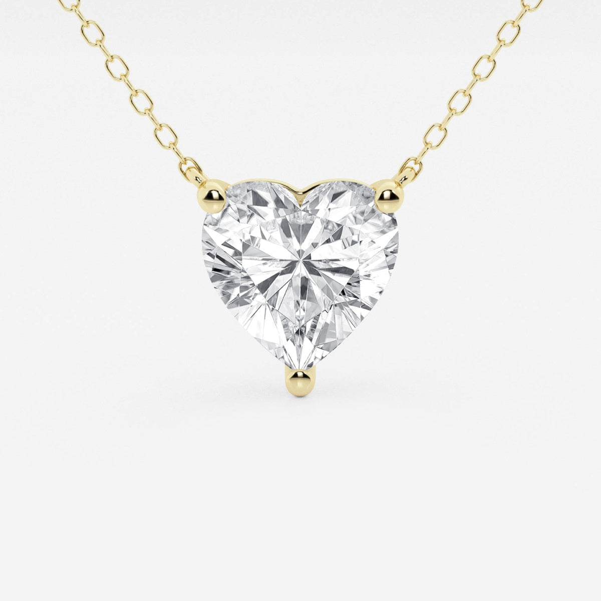 Floating heart-shaped lab-grown diamond pendant necklace in 14K white or yellow gold, featuring 2.00 CTW solitaire with F/G VS1 clarity.