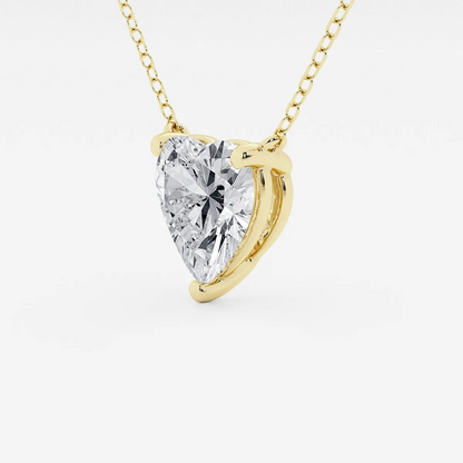 Floating heart-shaped lab-grown diamond solitaire pendant necklace in 14K white or yellow gold, F/G color, VS1 clarity, AGI certified.