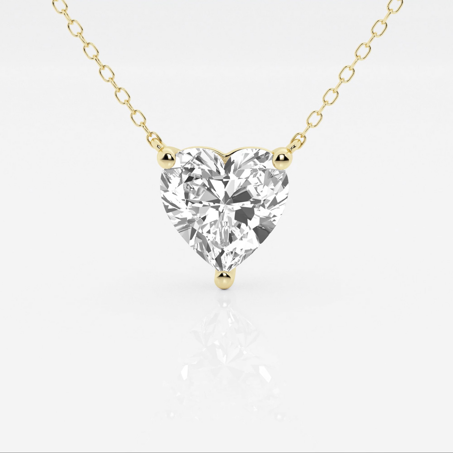 Floating heart-shaped lab-grown diamond pendant necklace in 14K gold, featuring 2.00 CTW F/G VS1 diamonds, AGI certified.