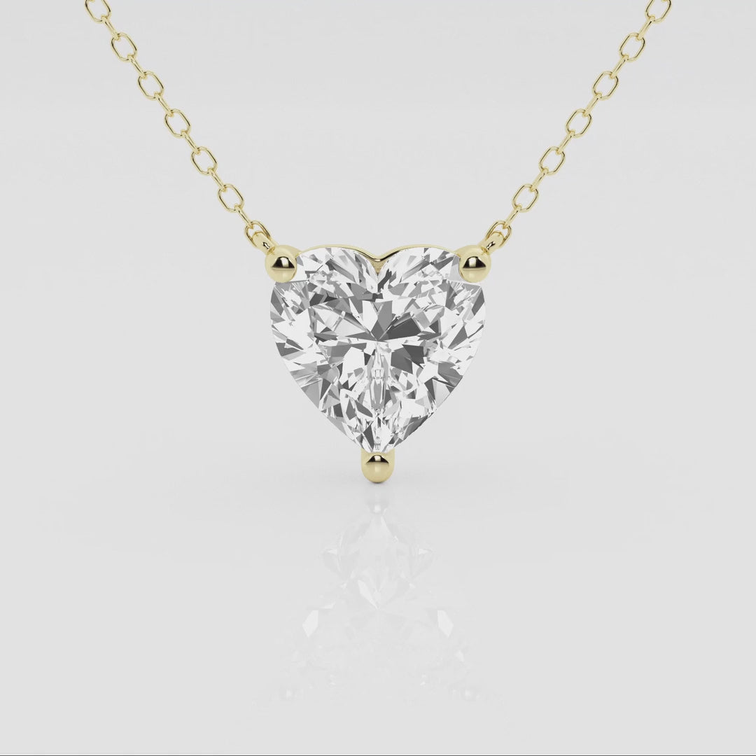 Floating heart-shaped lab-grown diamond pendant necklace in 14K white or yellow gold, featuring a 2.00 CTW solitaire design.