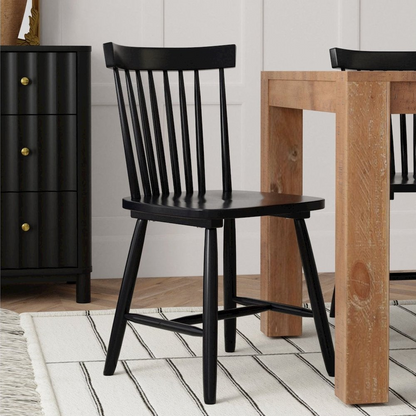 Set of two black Lyra side chairs by Start2Finish with sleek modern design and sturdy frame, ideal for dining or casual seating.