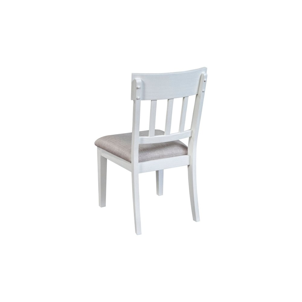 Pair of white Donham side chairs from Start2Finish, showcasing sleek wooden furniture with curved backs and cushioned seats.