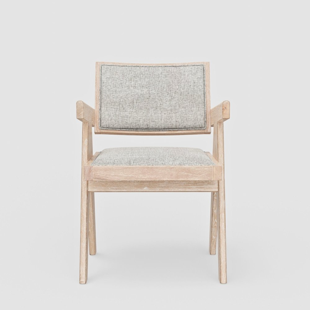 Pair of Raquel Side Chairs by Start2Finish with beige upholstered seats and dark wooden legs on a white background.
