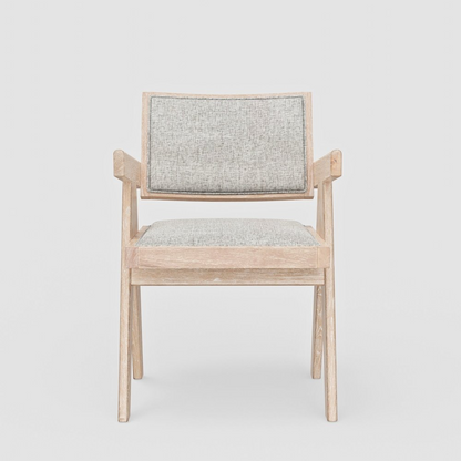 Pair of Raquel Side Chairs by Start2Finish with beige upholstered seats and dark wooden legs on a white background.