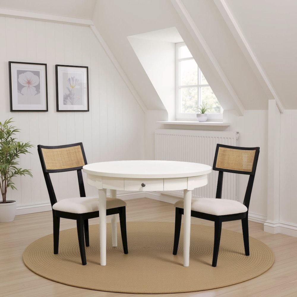 Avery round dining table by Start2Finish with a coconut milk finish, showcasing a smooth wooden surface and sturdy legs.