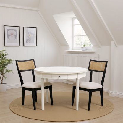Avery round dining table by Start2Finish with a coconut milk finish, showcasing a smooth wooden surface and sturdy legs.