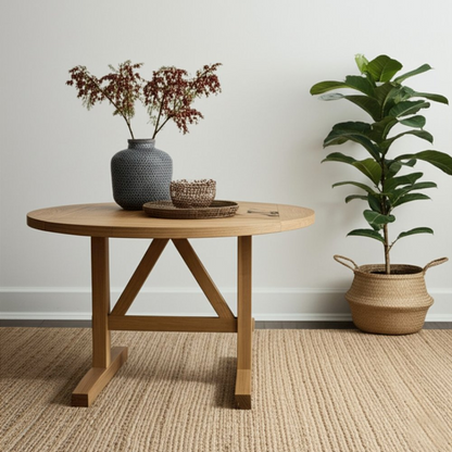 Start2Finish Eleanor round dining table made of sturdy wood with a smooth finish and modern design, set against a neutral background.