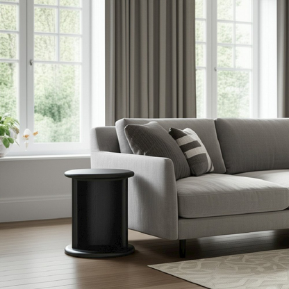 Black Gabrielle End Table by Start2Finish, showcasing a sleek modern furniture piece with a smooth surface and sturdy legs.