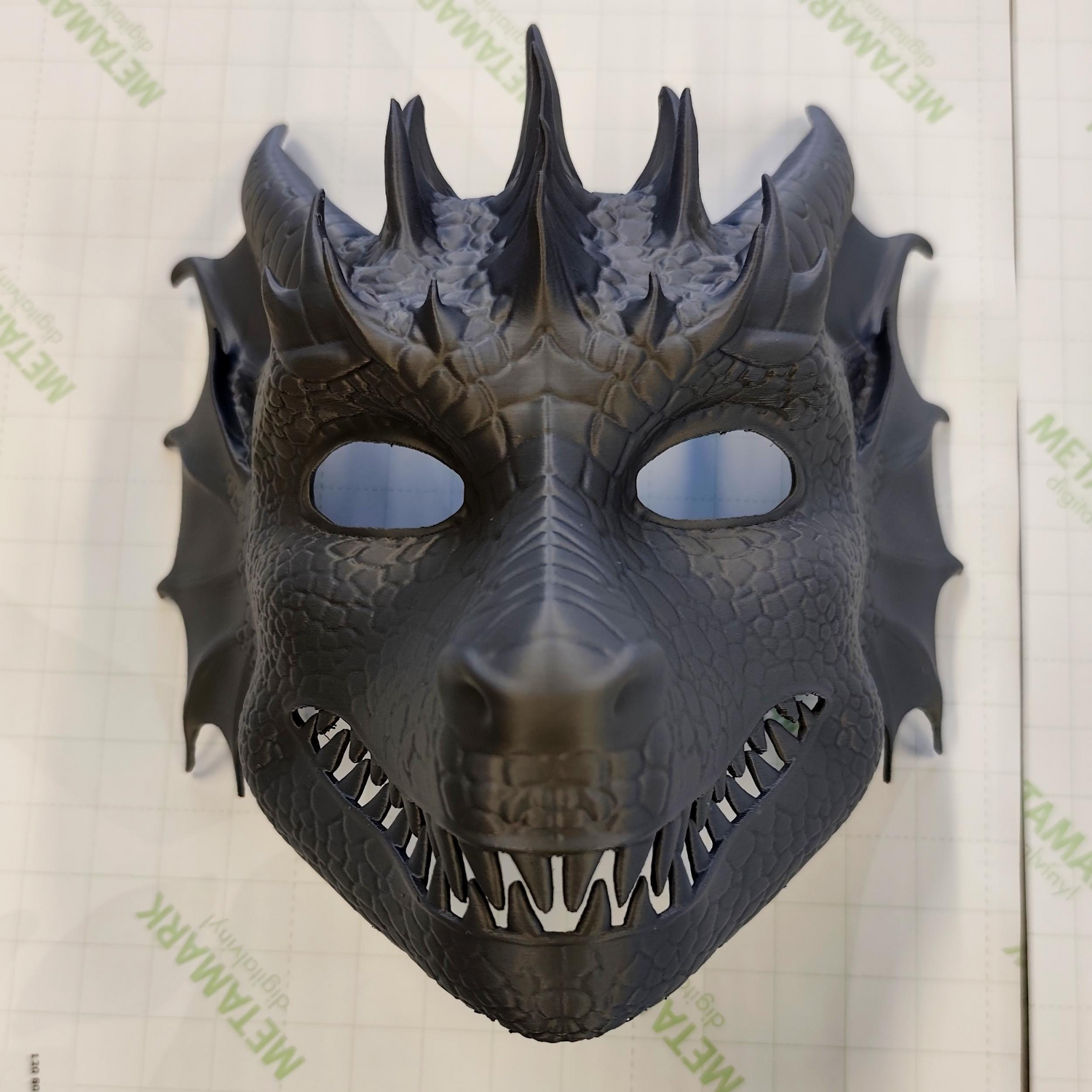 3D printed dragon mask from Start2Finish, fantasy cosplay costume with detailed scales and adjustable fit for mythical creature look.