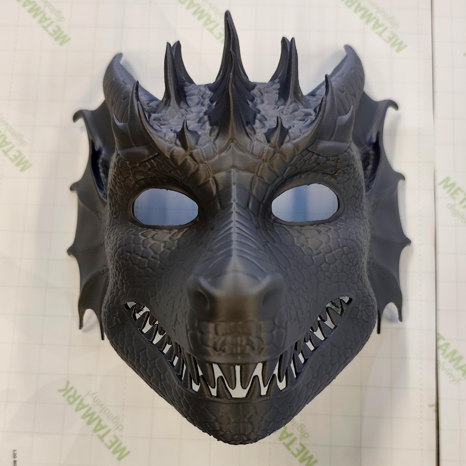 3D printed dragon mask from Start2Finish, fantasy cosplay costume with detailed scales and adjustable fit for mythical creature look.