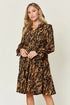 Pear Daisy double take printed ruffle hem long sleeve dress, full size, stylish fashion piece with floral pattern and elegant ruffle details.