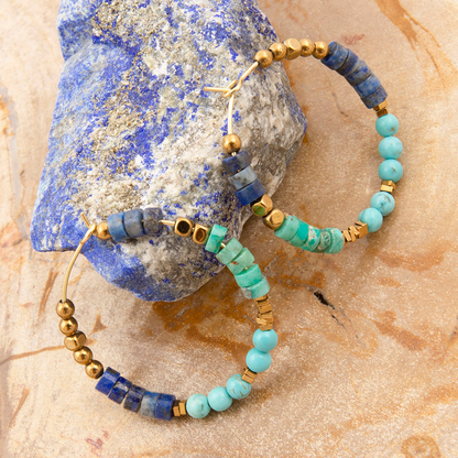 Blue turquoise and lapis gemstone golden hoop earrings, jewelry by Start2Finish featuring vibrant blue and gold accents.