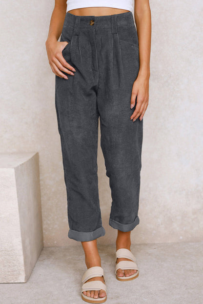 Gray corduroy high waist straight leg pants by Carmine Juneberry, showing the textured fabric and tailored fit.