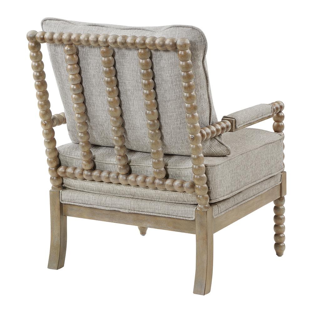 Fletcher Spindle Chair in fog fabric with rustic brown finish, showing the armchair with spindle back and wooden legs.