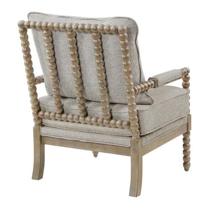 Fletcher Spindle Chair in fog fabric with rustic brown finish, showing the armchair with spindle back and wooden legs.