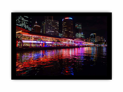 Framed print of Darling Harbour Sydney at night, featuring city lights and waterfront views, by Start2Finish for home decor.