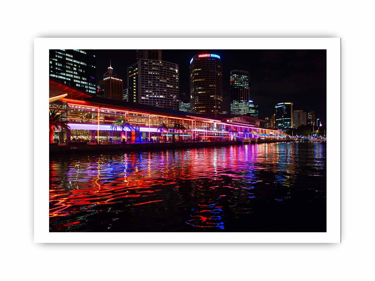 Framed print of Darling Harbour Sydney at night, featuring city skyline and illuminated buildings, from Start2Finish home decor collection