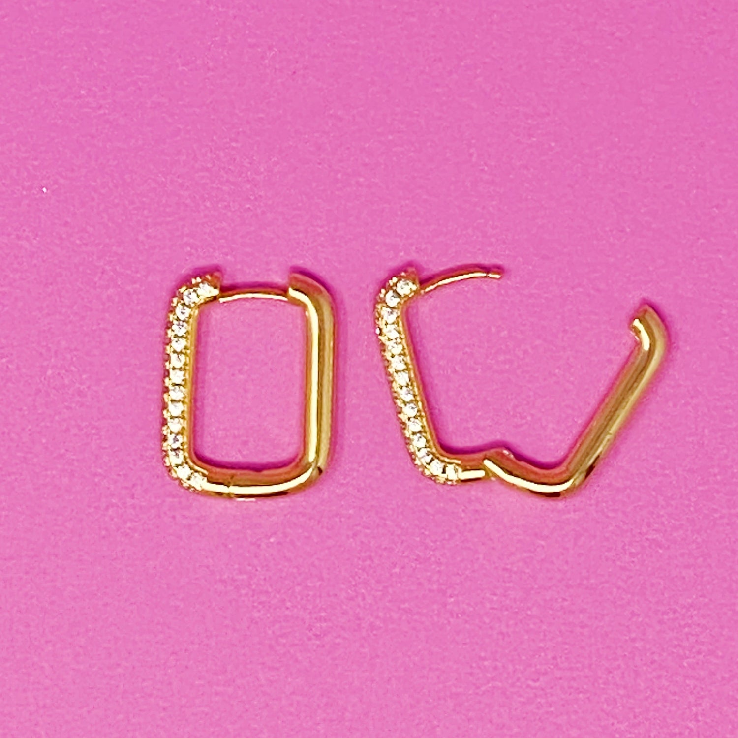 Fuchsia Hercules So Chic hoop earrings featuring sleek, gold-tone hoops with a modern, stylish design for jewelry enthusiasts.