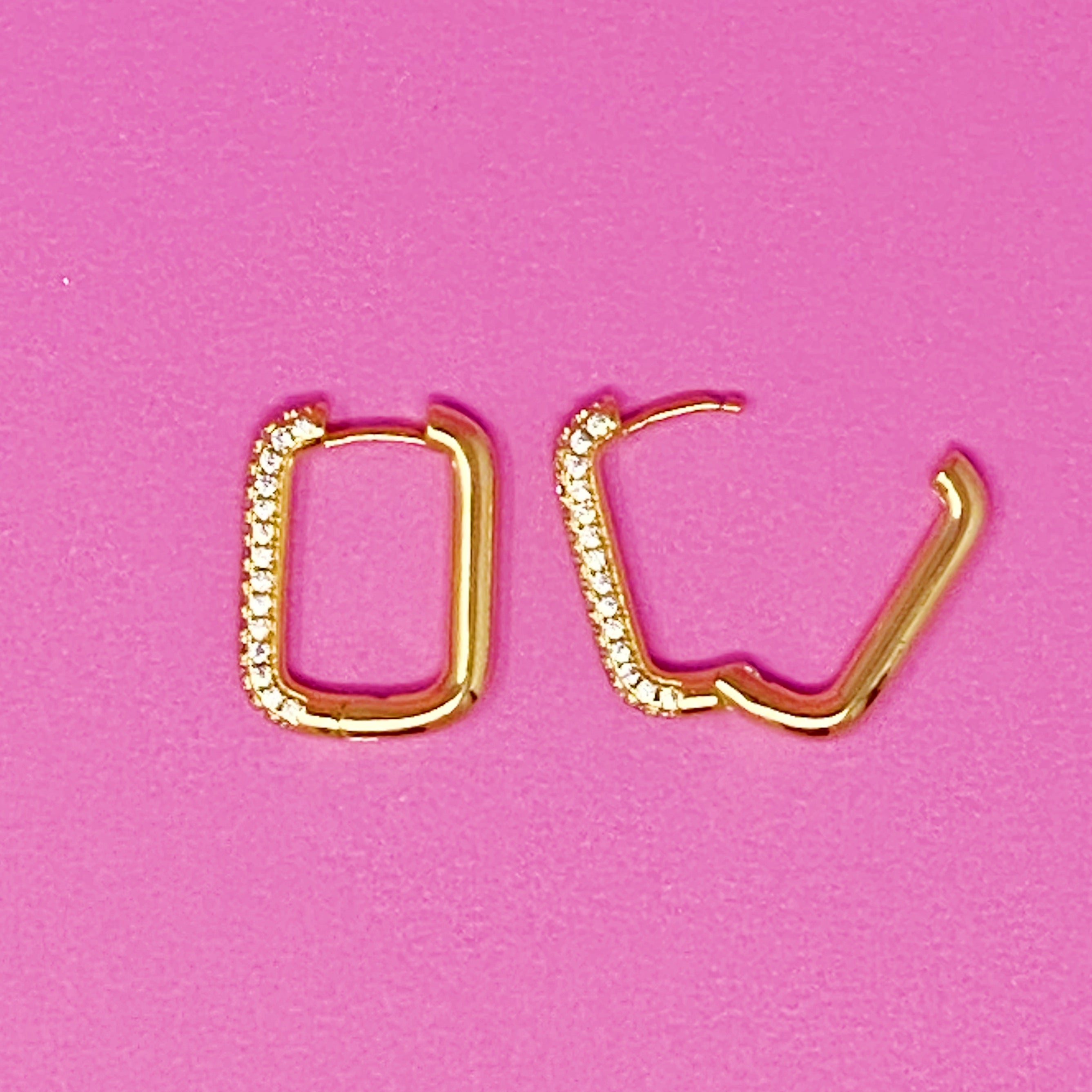 Fuchsia Hercules So Chic hoop earrings featuring sleek, gold-tone hoops with a modern, stylish design for jewelry enthusiasts.