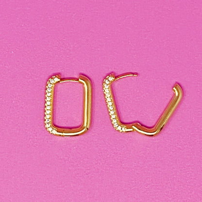 Fuchsia Hercules So Chic hoop earrings featuring sleek, gold-tone hoops with a modern, stylish design for jewelry enthusiasts.