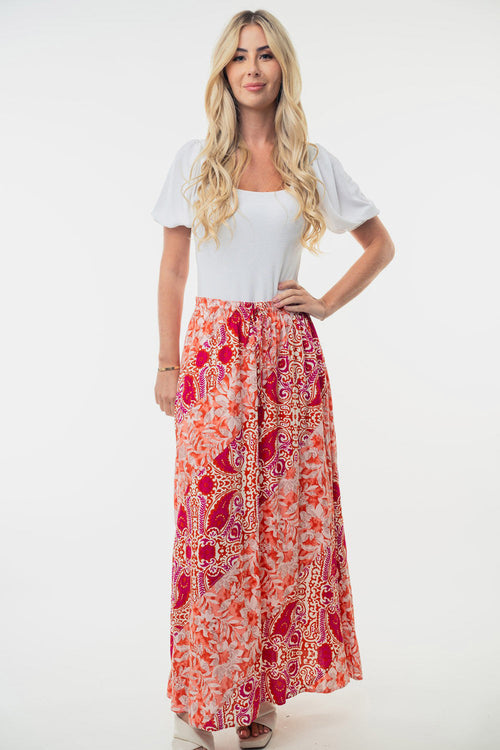 White Birch full-size high-waisted floral woven skirt by Jade Icarus, displayed on a mannequin with detailed fabric pattern.
