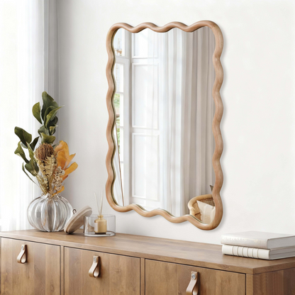 Wavy solid wood wall mirror with curved frame, ideal for bathroom, bedroom, or entryway decor, by Start2Finish.