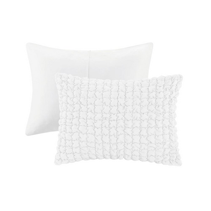 Evelyn 3-piece stripe ruched comforter set in white with matching pillow shams, displayed on a bed in a cozy bedroom setting.