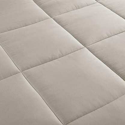 Luxury down alternative comforter with 300 thread count cotton shell by Start2Finish, showing plush, quilted design and soft fabric.