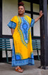 White Baobab African Dashiki dress, long kaftan style T-shirt with vibrant colorful African print and traditional design.
