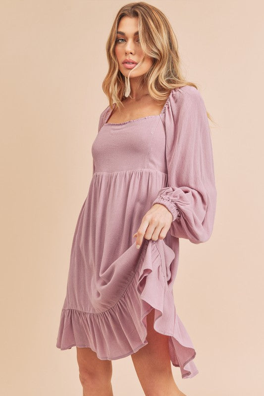 Aemi + Co ruffled hem square neck balloon sleeve mini dress by Jade Icarus, featuring ruffles, square neckline, and balloon sleeves.