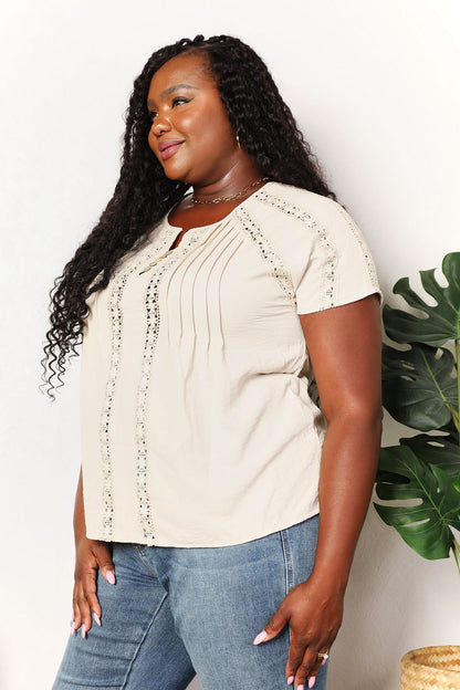 Pear Daisy double take crochet buttoned short sleeves top with intricate crochet pattern and button details, perfect for casual wear.