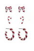 Set of three candy cane holiday earrings from Start2Finish, featuring festive red and white jewelry for seasonal wear.