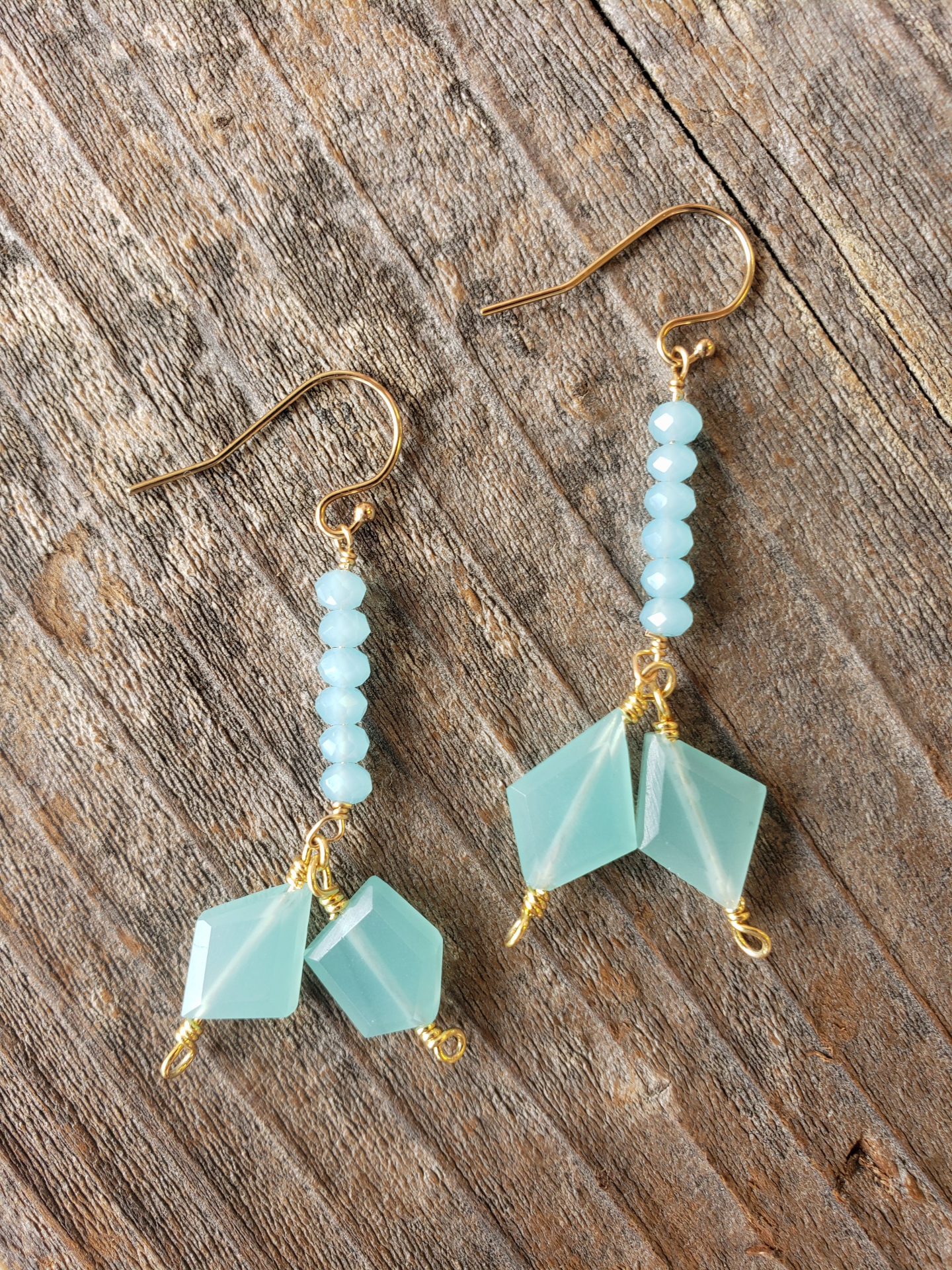 Start2Finish Del Mar earrings featuring polished chalcedony gemstones and silver hooks, showcasing elegant jewelry design.
