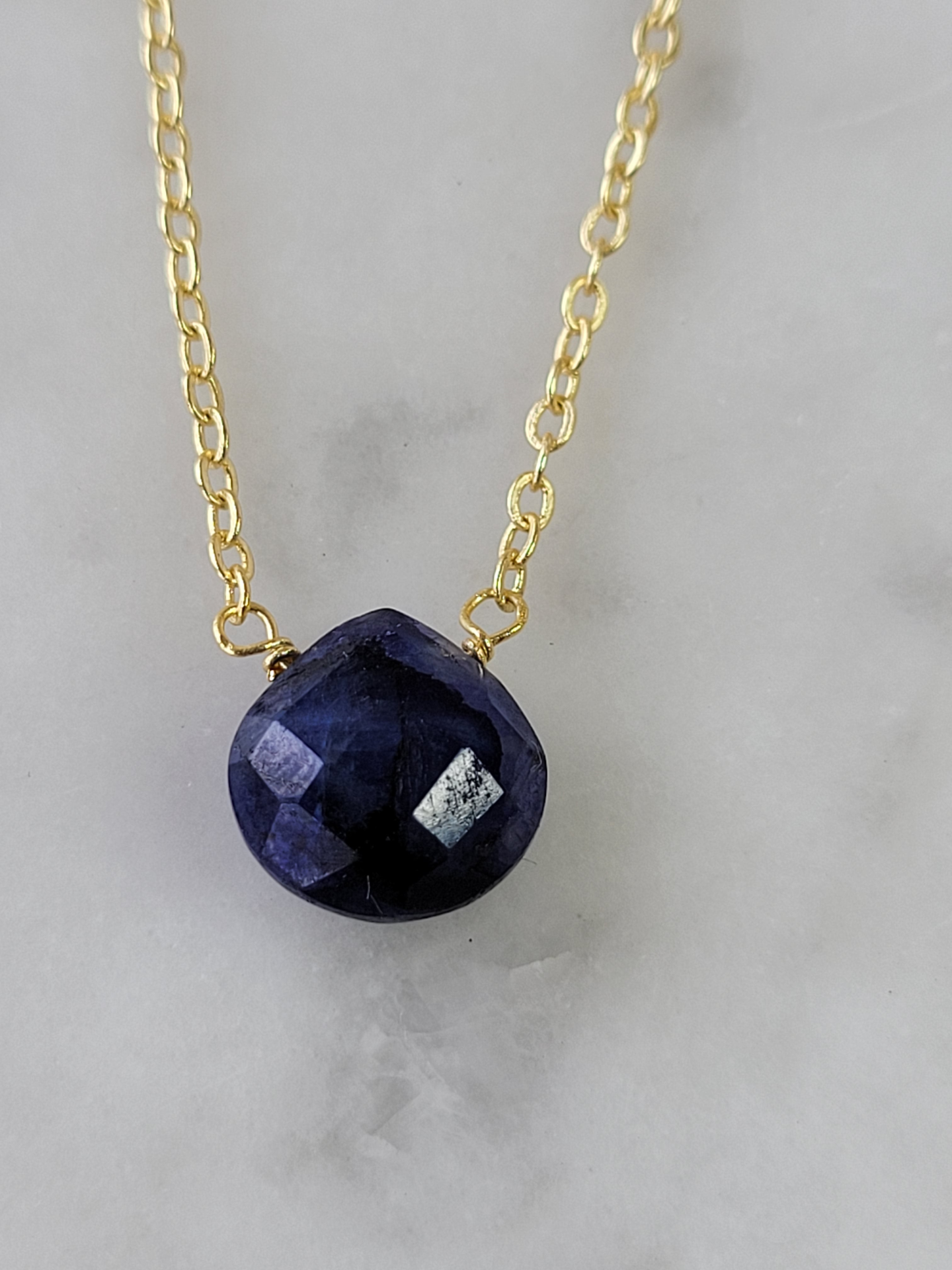 Start2Finish Stephanie Delicate Drop Necklace featuring a sparkling sapphire pendant on a fine chain.