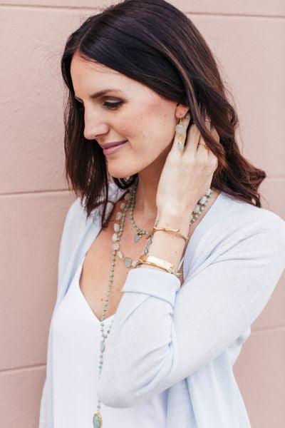 Start2Finish Victoria Ojai gold earrings featuring smooth chalcedony stones and elegant gold settings.