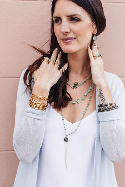 Victoria Ojai Gold Earring with Chalcedony gemstone, elegant jewelry piece featuring gold setting and blue chalcedony stone.