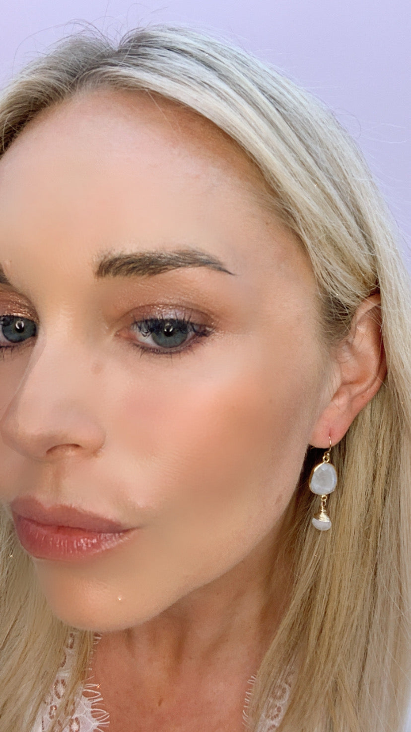 Victoria earrings in moonstone featuring elegant jewelry design with shimmering, translucent moonstone gemstones and sterling silver settings.