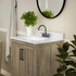 Contemporary 24-inch bathroom vanity with integrated sink from Start2Finish, featuring sleek modern design and wood finish.