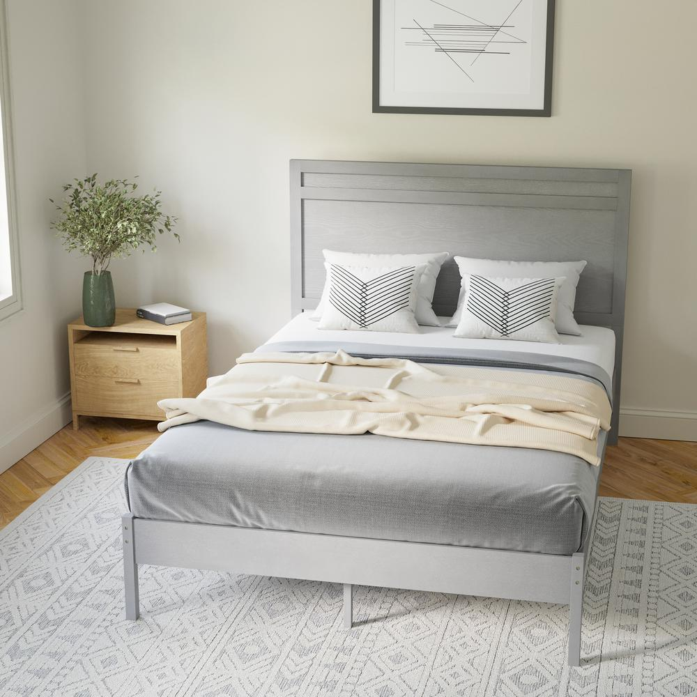 Modern King size wooden platform bed with headboard by Start2Finish, showcasing a sleek design and sturdy construction in a bedroom setting.