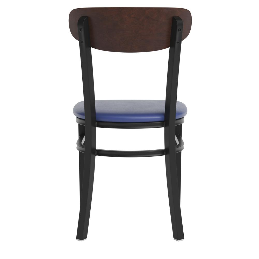 Commercial dining chair with vinyl upholstered seat and wood boomerang back, by Start2Finish, shown in a modern restaurant setting