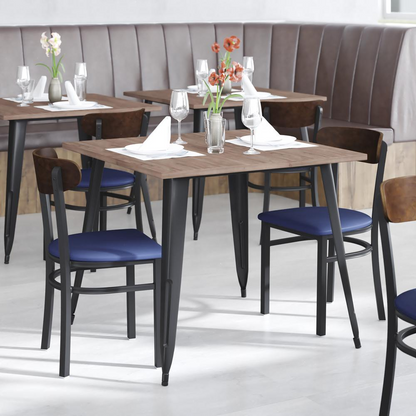 Commercial dining chair by Start2Finish with vinyl upholstered seat and wood boomerang back for restaurant or cafe furniture.