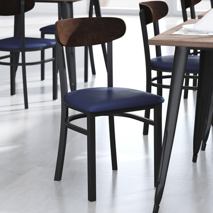 Commercial dining chair with vinyl upholstered seat and wood boomerang back, designed for restaurant furniture.