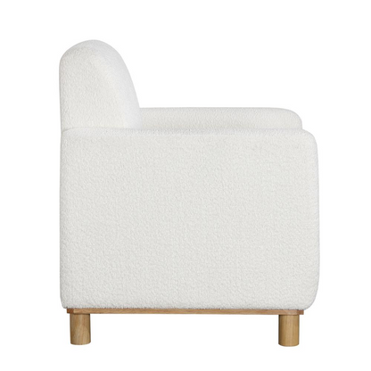Start2Finish Maizie white boucle fabric armchair with plush cushioning and wooden legs, showcasing a stylish and cozy furniture piece.