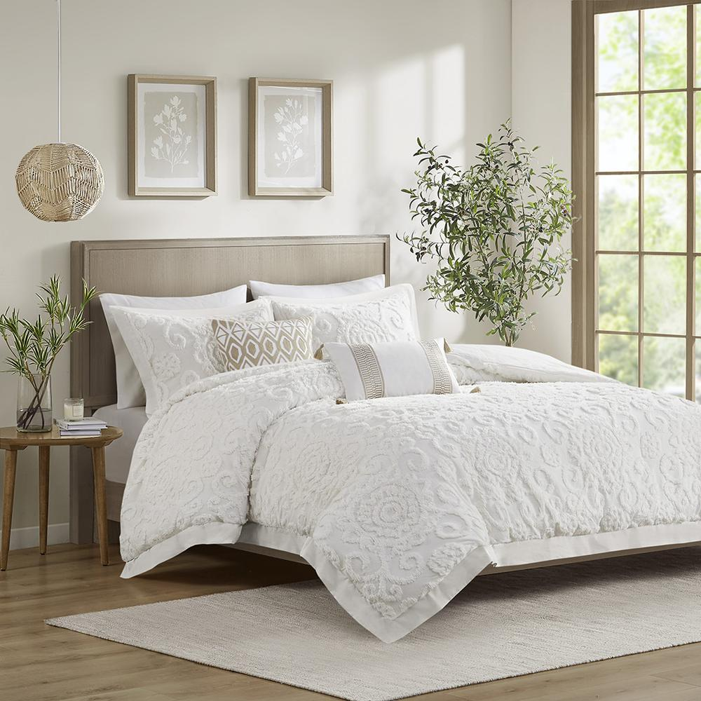 Start2Finish comforter mini bedding set with patterned fabric and matching pillow shams in a cozy, decorative bedroom setting.